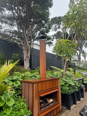 Big Brute Corten steel outdoor fireplace with a chimney
