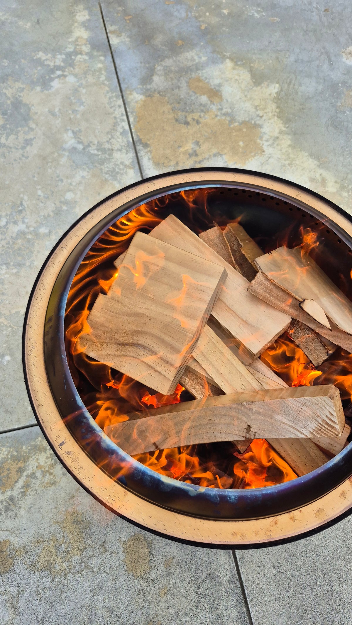Outdoor fire pit with burning wood