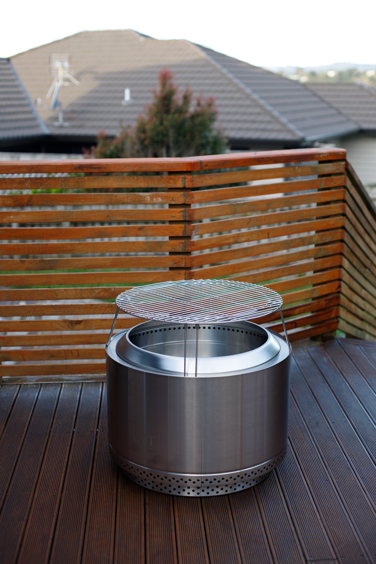 Stainless steel fire pit with grill