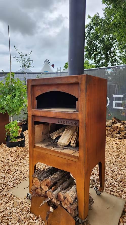 Corten Steel outdoor firebake pizza oven with fire woods