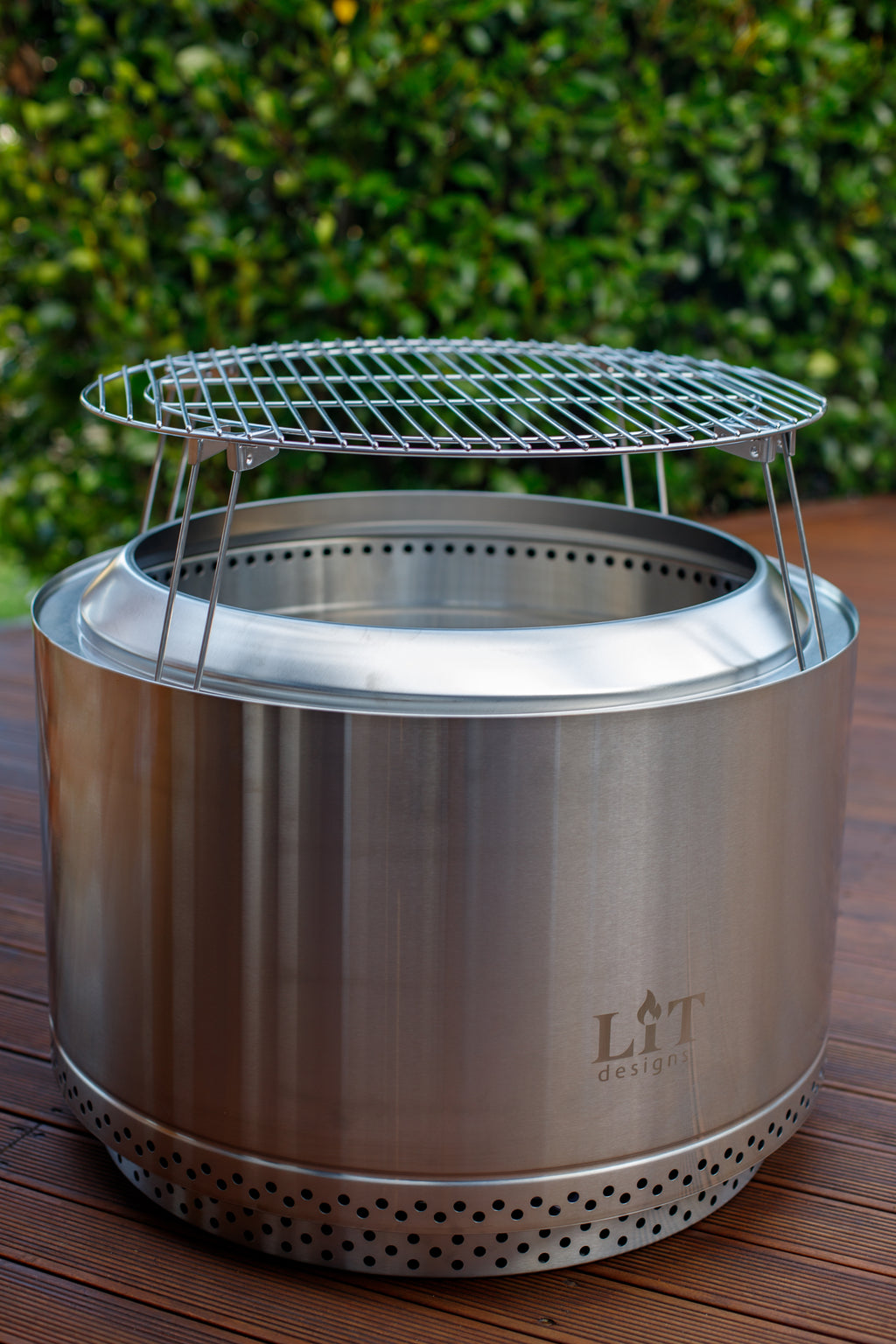 Stainless steel fire pit with grill
